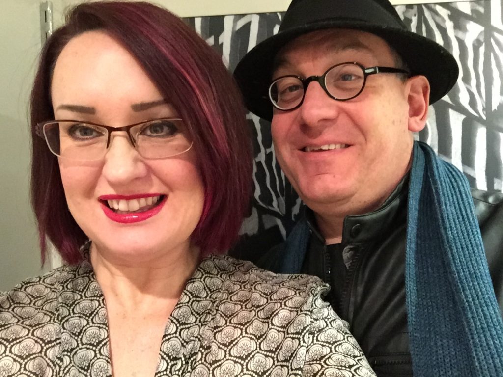 Mardi and Michawl smiling dressed up to go out to dinner.